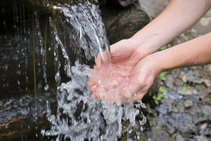 Gushing water washing hands